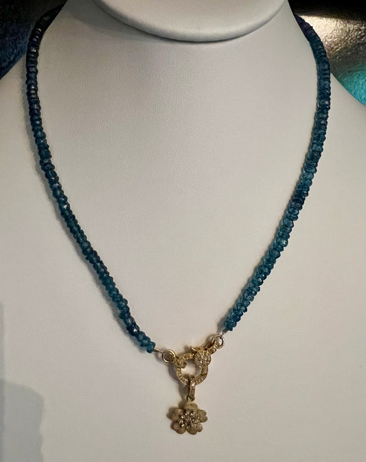 Blue Topaz necklace w diamond Claw and Gold Matte Flower